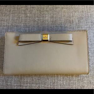 Kate Spade cream  color wallet with bow detail